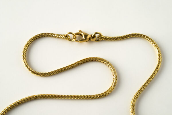 Kräftige 750/ Fuchsschwanzkette mit granuliertem 900/ Gold- Rubinanhänger