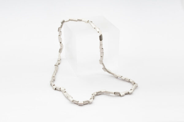 Kissen-Kette oder Armschmuck