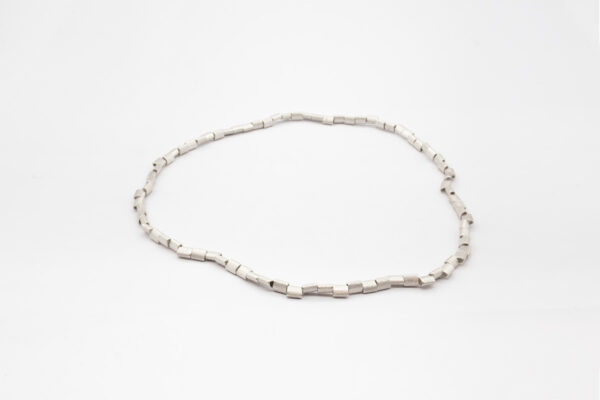 Kissen-Kette oder Armschmuck